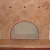 Travertine Tile Face Fireplace and raised hearth - decorative tile arch