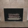 Travertine Tile Face Fireplace and hearth - decorative gas fireplace logs