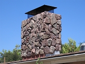 Closeup of eldorado stone chimney and chimney cap