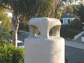 Unique stucco chimney crown and cap