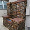 Outdoor True Stone Gas Fireplace Wall with blue fire glass