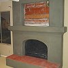 Custom Fireplace with spanish tile hearth under construction before plaster finish